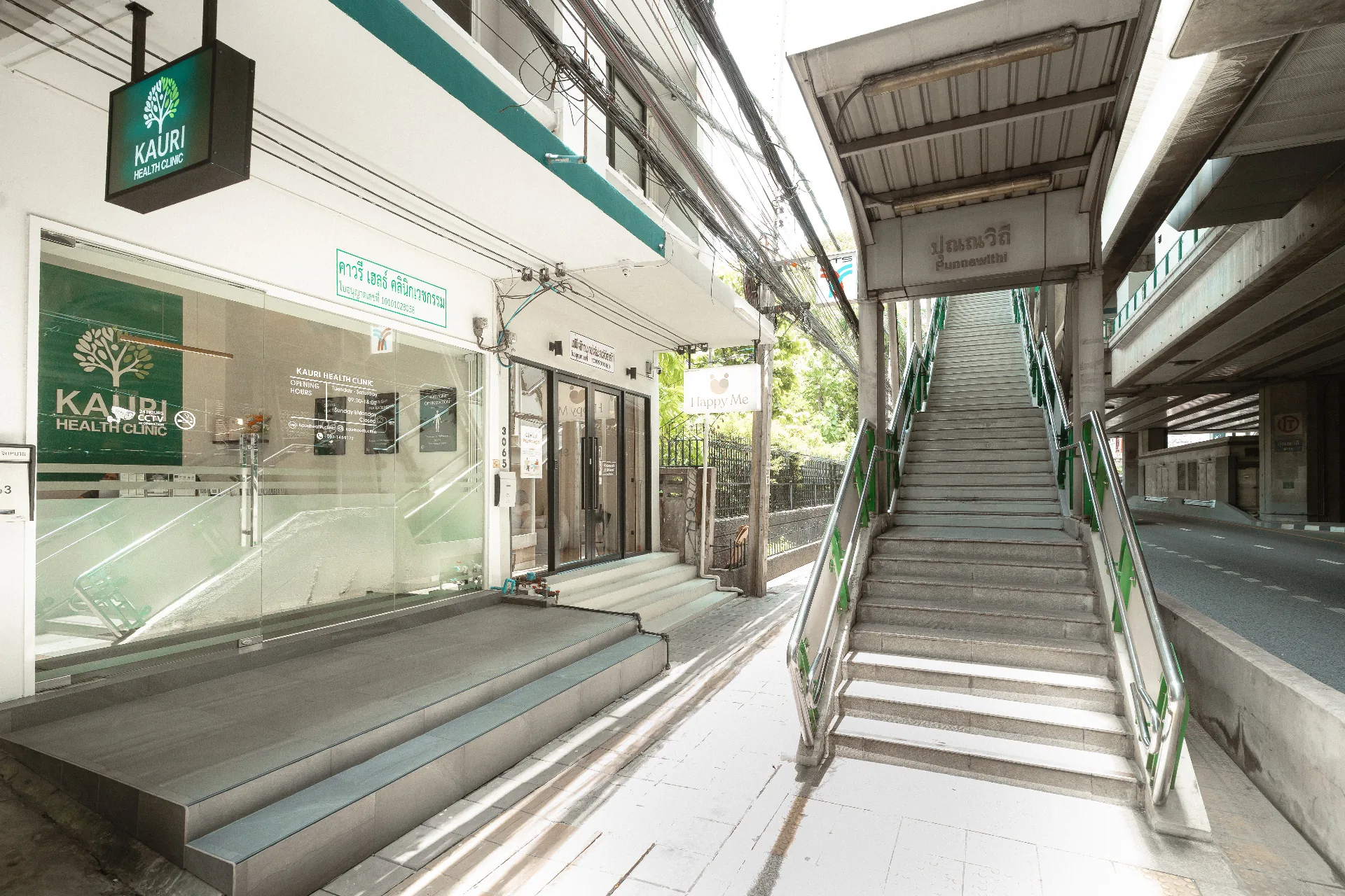 Kauri Health Clinic entrance beside the stairs at BTS Punnawithi